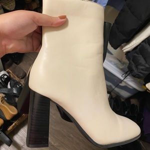 Black and white two toned heeled boots